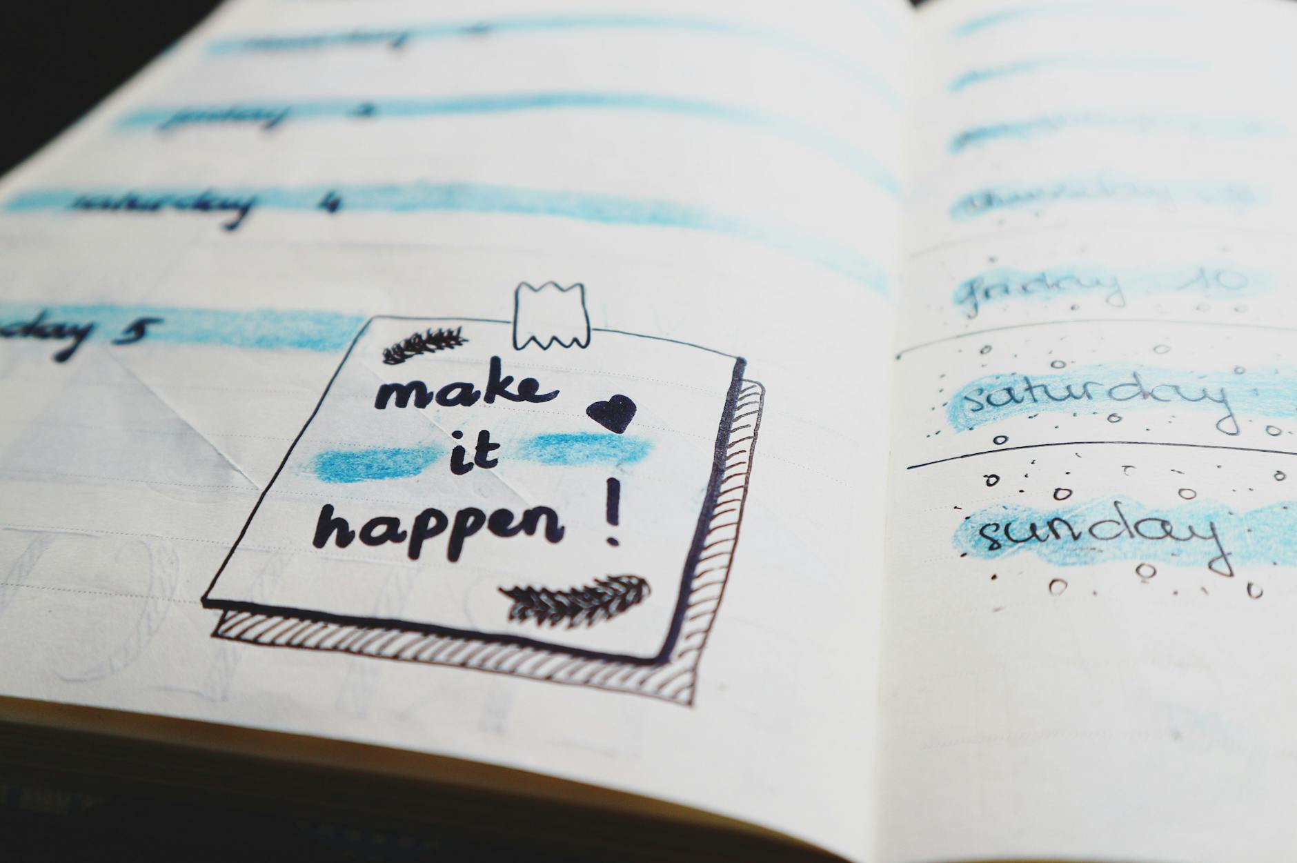 The bottom of a day planner page with a note saying, "Make it happen!"