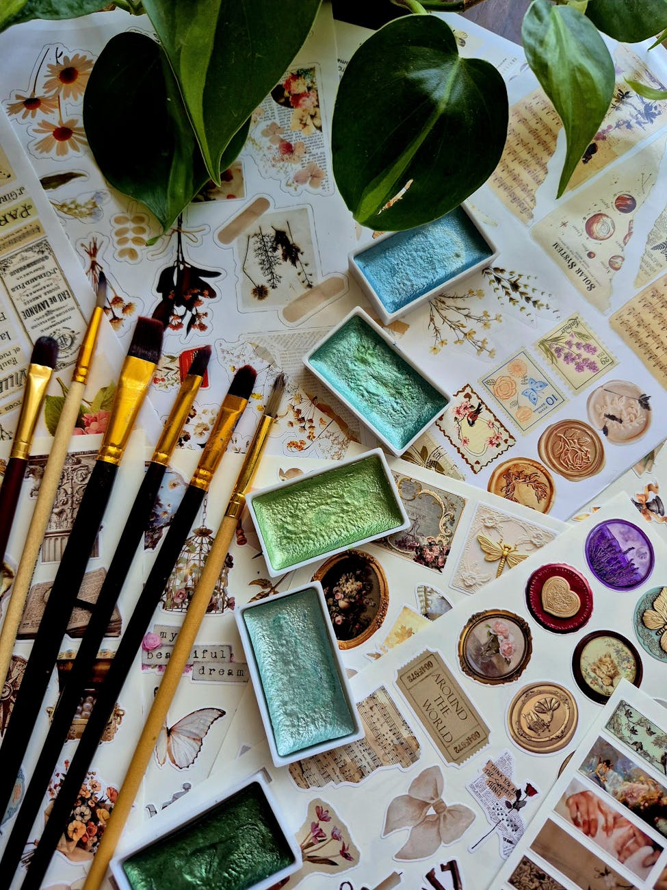 A collection of paints and stickers.