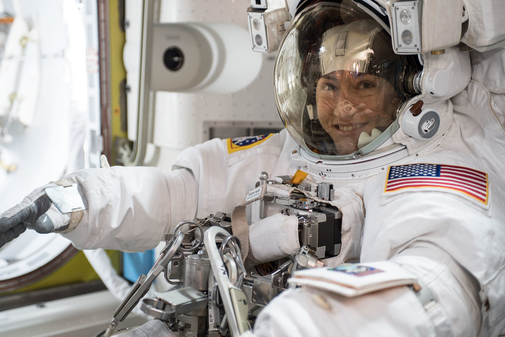 Christina Koch, astronaut, in her white space suit.